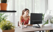 © StockPhotoPro - Young woman working with her computer