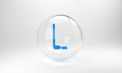 Wall Mural - Blue Ice hockey stick and puck icon isolated on grey background. Glass circle button. 3D render illustration