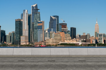 Empty urban asphalt road exterior with city buildings background. New modern highway concrete construction. Concept of way to success. Transportation logistic industry fast delivery. New York. USA.