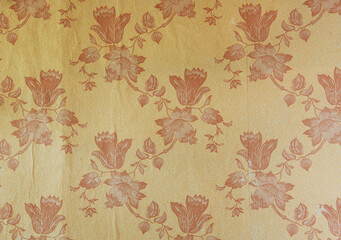 old wallpaper on the wall. old wallpaper for texture or background.