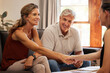 © Nina Lawrenson/peopleimages.com - Senior couple, handshake and finance worker welcome, thank you or agreement with consulting with money or retirement savings. Advisor planning funeral insurance, cash growth or investment with client