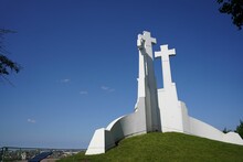 Monument Of Three Crosses In Lithuania Captured Against A Blue Sky