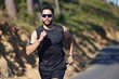 © Wesley J/peopleimages.com - Running, man and outdoor cardio fitness in nature for wellness, marathon training and healthy lifestyle in Dubai, UAE. Sports athlete, speed runner and morning exercise with sunglasses on summer road