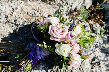 Wall Mural - Beautiful tender wedding bouquet and rings.