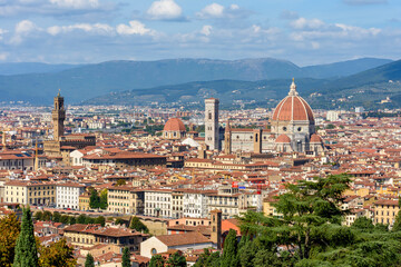 Florence cityscape with Duomo cathedral and Palazzo Vecchio palace over city center, Italy