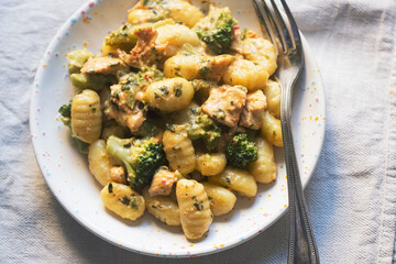 Wall Mural - Gnocchi dumplings with chicken broccoli sauce 