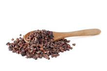 Profile View Of Organic Raw Cacao Nibs Pile With Natural Wood Spoon On. Isolated On White Background With Selective Focus.