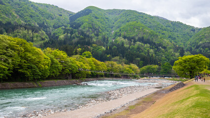 Bridge over the river to Shirakawa-go village in Gifu and Toyama Prefectures Japan