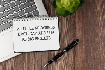 Wall Mural - Note pad with inspirational text - A little progress each day adds up to big result