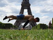 Straddle Planche in front of the Eiffel Tower in Paris, France