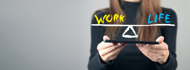 Work Life Balance, young woman holding a tablet