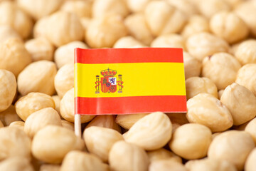 Poster - Flag of Spain on hazelnuts. Origin of nuts, growing hazelnuts in Spain concept