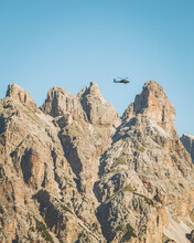 View Of An Army Helicopter In The Dolomites, Italy.