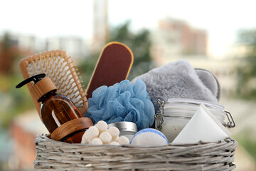 Poster - Spa gift set with different products on blurred background, closeup