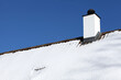 Snowy roof and chimney