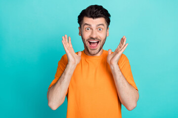 Wall Mural - Photo of young attractive handsome excited positive bearded man hands palms shock reaction unexpected open mouth isolated on aquamarine color background