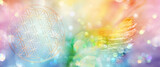 Fototapeta Kosmos - Banner Blume des Lebens mit schillerndem Engelsflügel in einem glitzernden Feld regenbogenfarbenen Lichts