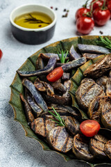 Wall Mural - Sweet purple potatoes fries on a light background. vertical image. top view. place for text