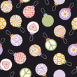 © Elena - Christmas seamless pattern with retro groovy balls on a black background. Holiday winter print. Vector  illustration.