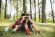 © Serhii - kids in green forest playing,concept of kids vacations and travel