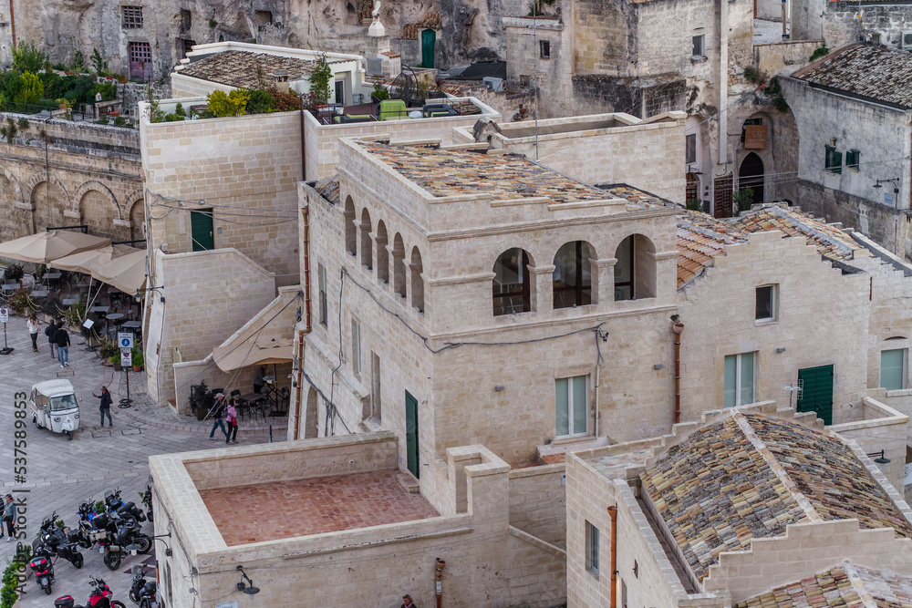 old stone houses and churches on the ravine slopes in the historic ...