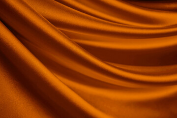 Wall Mural - Dark orange brown silk satin. Drapery fabric. Curtain. Luxury background for design. Beautiful soft folds. Wavy lines. Golden color. Christmas, birthday, Mother's day, Valentine.