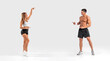 © Mike Orlov - Banner. Fit couple at the gym shows on copy space isolated on white background . Fitness concept. Healthy life style.
