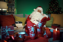 Santa Claus Sleeping On The Couch