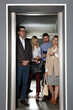 © New Africa - Group of office workers in modern elevator