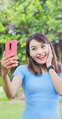 Wall Mural - asian woman take selfie