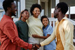 © Seventyfour - Portrait of happy black family gathering for Summer party outdoors