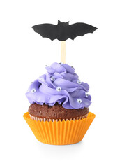 Wall Mural - Tasty Halloween cupcake with paper bat on white background