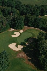 Vertical aerial view of a green rural golf course in Otsego, Michigan