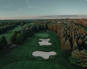 aerial view of a green rural golf course in otsego, michigan