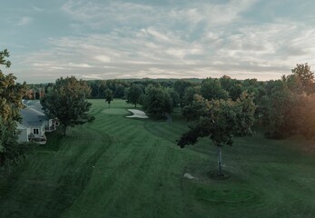 Aerial view of a green rural golf course in Otsego, Michigan