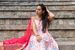 © ADDICTIVE STOCK - Dreamy ethnic woman in traditional wear