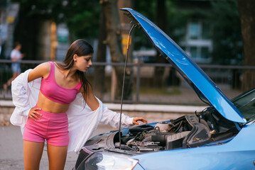 Sticker - Woman with broken car on the road. Look for help.