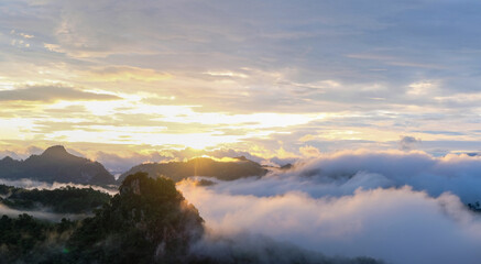 beautiful mountain sunrise with sunlight and fog over northern thailand s mountains