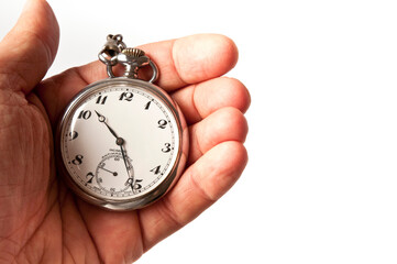 man hand holding a pocket watch