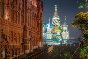 Wall Mural - Kremlin and St. Basil's Cathedral at dramatic dawn, red square, Moscow, Russia