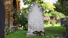 Gravestone In Church Cemetery