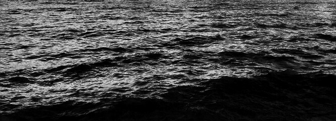 Wall Mural - black water dark surface and background.