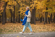 © Andrey_Arkusha - Beautiful middle-aged woman walking in autumn park