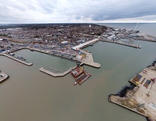 Wall Mural - Aerial view of Lowestoft harbour and port with boats docked and far reaching views. Lowestoft England. 