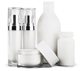 Set of cosmetic products in white containers isolated