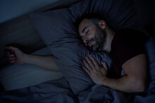 Close-up Of Handsome Bearded Man Sleeping In Bed At Home Enjoying Good Sleep, Top View, Copy Space
