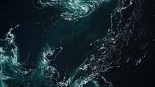 4K Drone Video With Birds-eye View Of The Abstract And Powerful Water Currents, Rapids And Whirlpools Of The Worlds Larges Maelstrom Saltstraumen, Norway.