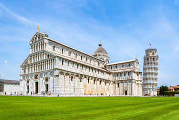 View of catholic basilica and leaning tower in Pisa