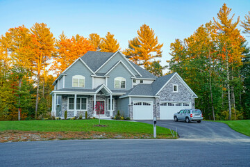 Wall Mural - colorful autumn trees and new built luxury houses in residential area