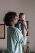 © Alberto Bogo/Stocksy - Father Kissing His Baby